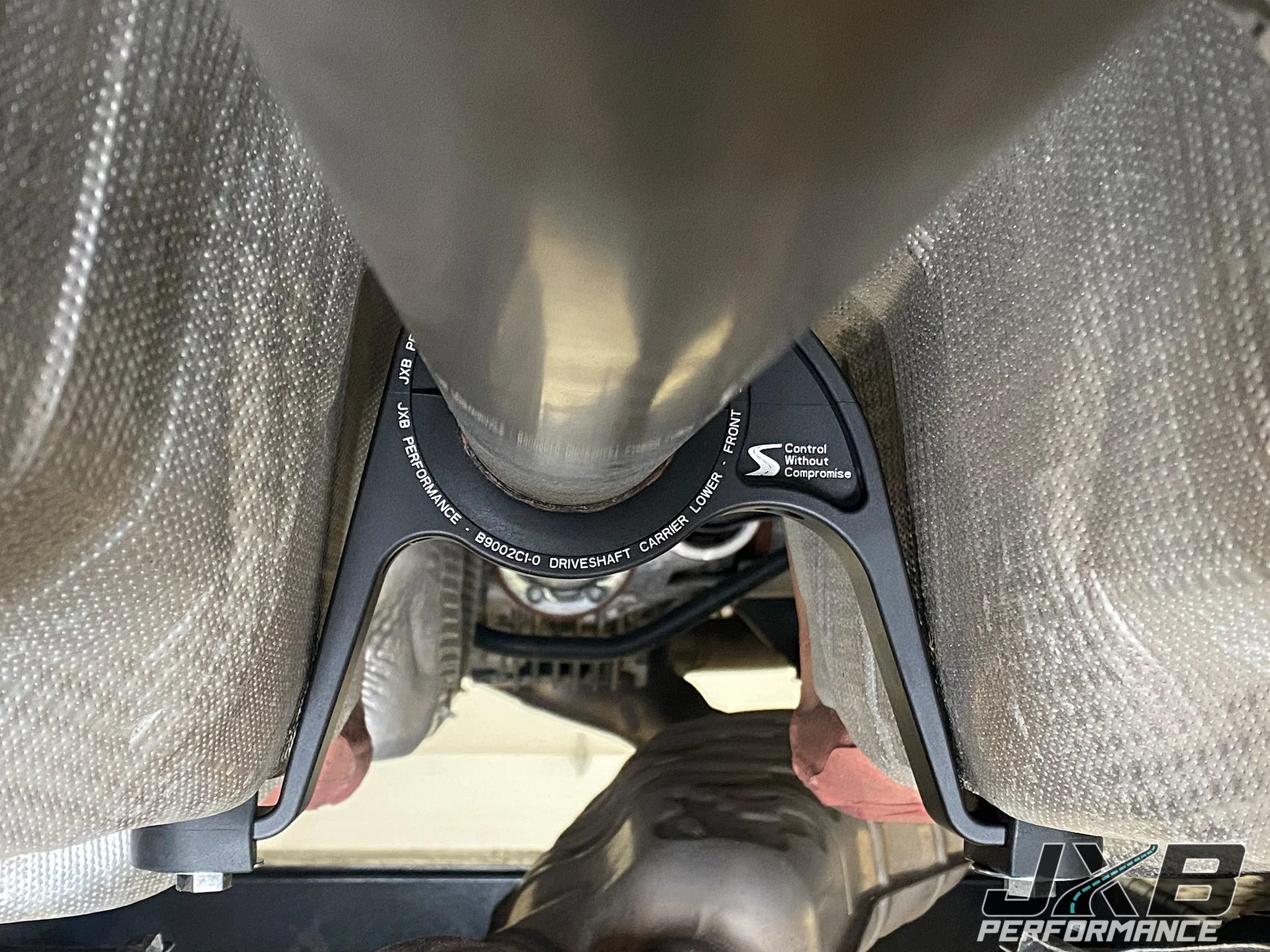 JXB Performance B9002A0 both-bushing driveshaft carrier installed after